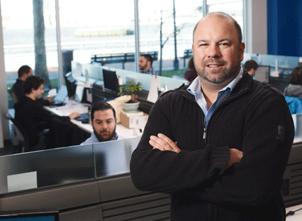 Ken in Camden office - Employees in the background